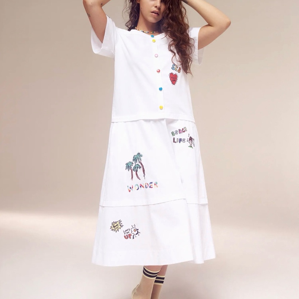 Mira Mikati off the shoulder midi length dress